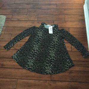 A.Gain cheetah print tunic size small, NWT.